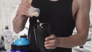 Man making a weight gainer shake